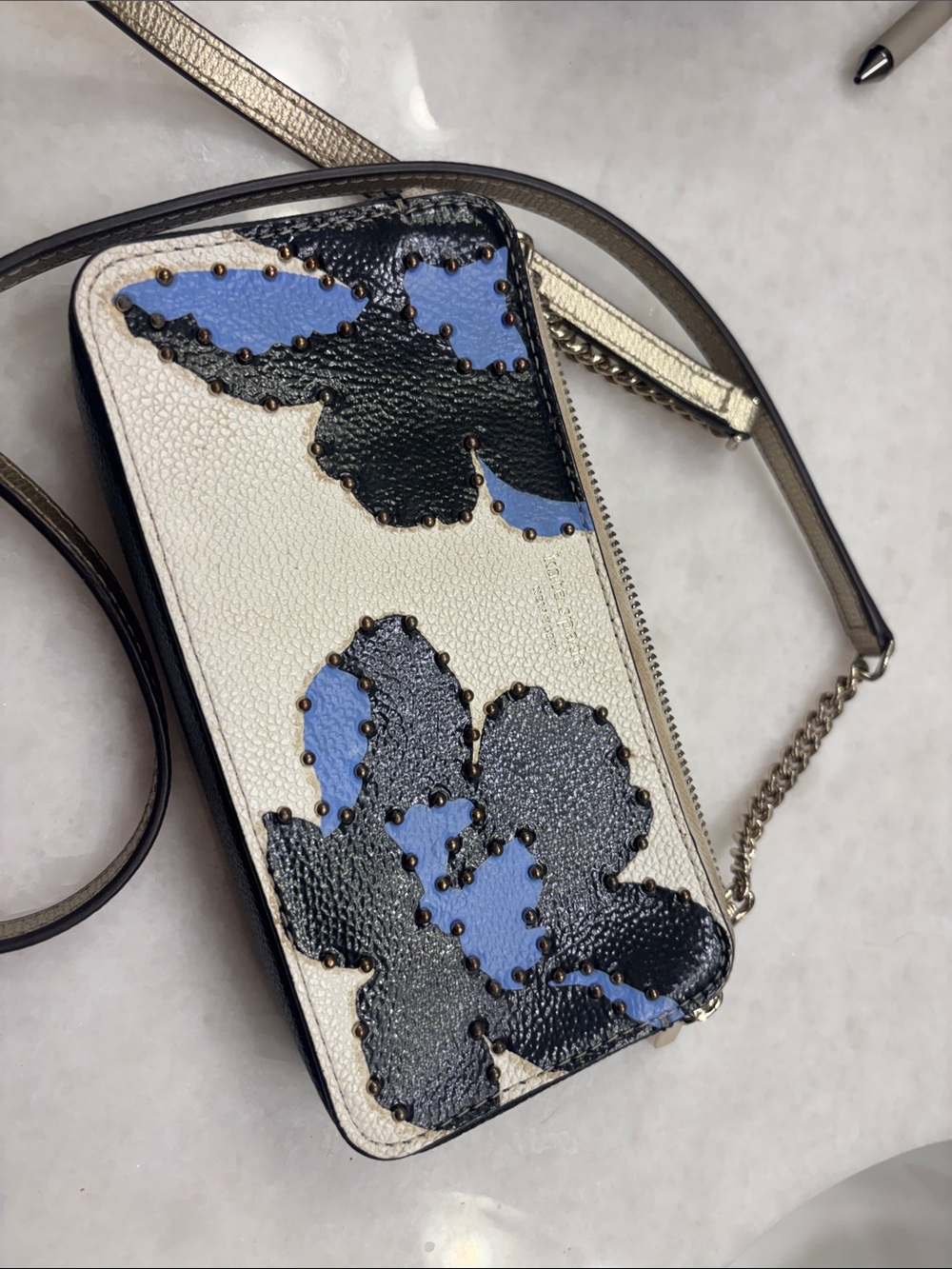 kate spade White Crossbody with Blue and Black Floral Appliqué chain